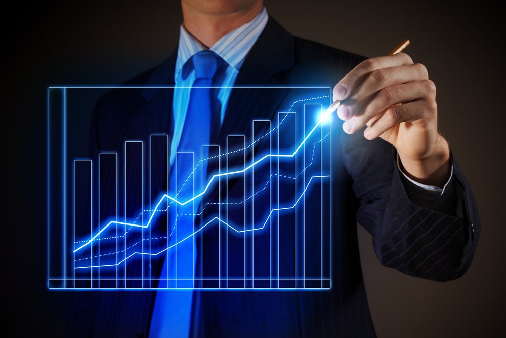 Closeup image of businessman drawing 3d graphics-2
