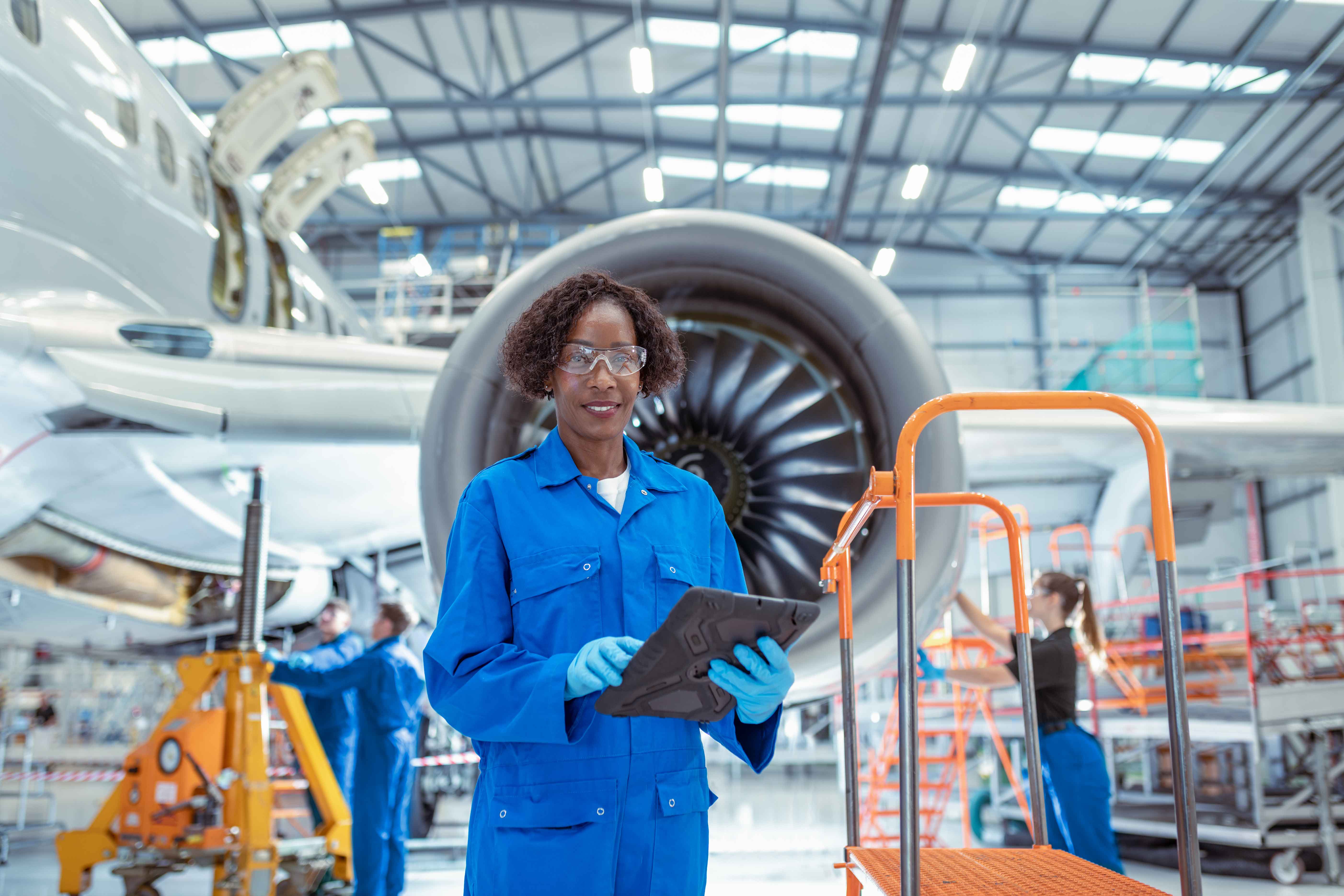 woman-in-front-of-plane